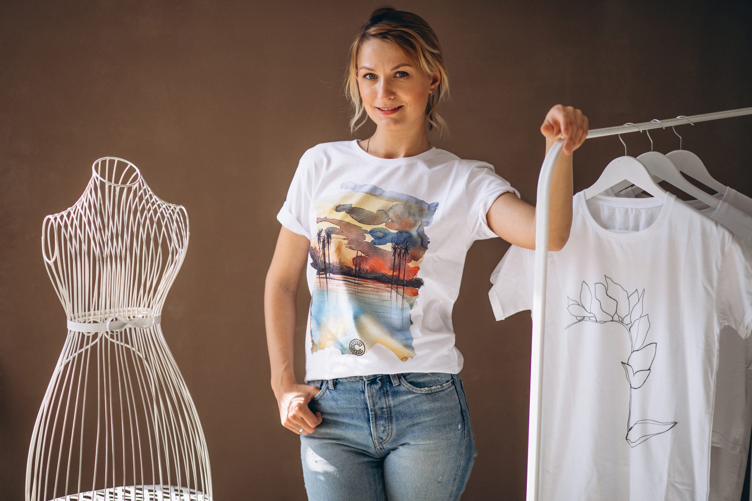Woman chosing a white shirt | nfrmt